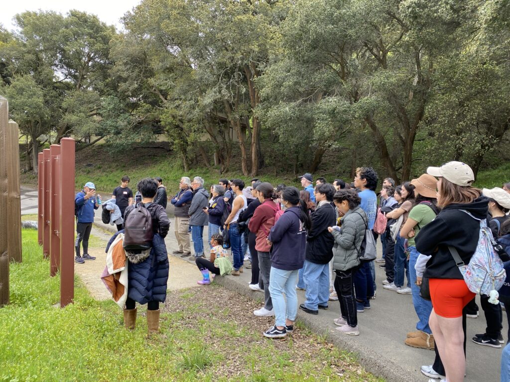 Professor Harvey Dong, and his Asian American and Asian Diaspora Studies classes with many Chinese Chapter alumni on a guided tour of Angel Island's Immigration Station